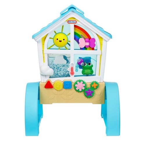 Assembling little house and cart with little pieces to assemble colorfully  