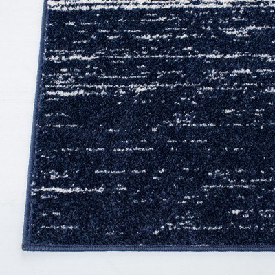 Navy and Ivory Ombre Round Synthetic Area Rug