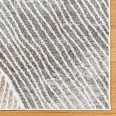 Gray and Beige Abstract Tufted Synthetic 5' x 7' Area Rug