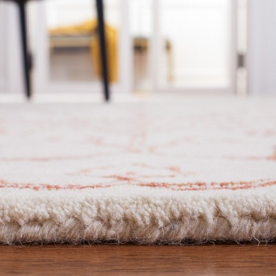Ivory and Rust Floral Hand-Tufted Wool Area Rug, 4' x 6'