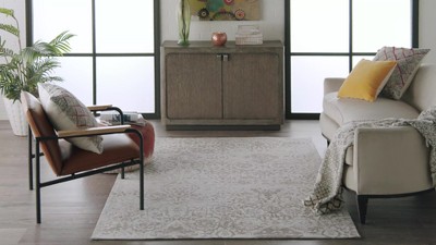 Ivory and Navy Medallion Synthetic 4' x 6' Area Rug