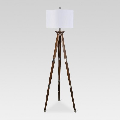 grey wooden tripod floor lamp