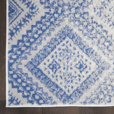 Ivory Geometric Synthetic Easy Care 6' x 9' Area Rug