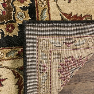Black and Ivory Floral Synthetic 5' x 7' Area Rug