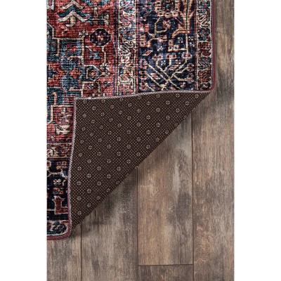 6' x 9' Rust and Blue Synthetic Traditional Area Rug