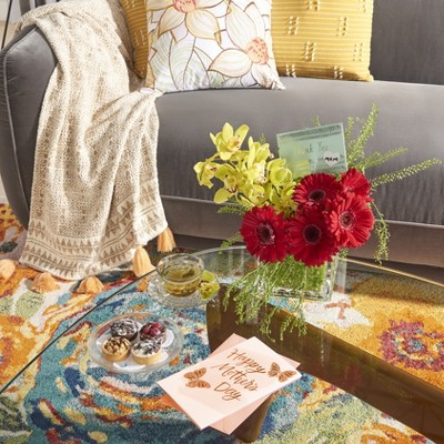 Ivory Multicolor Floral Synthetic 4' x 6' Area Rug