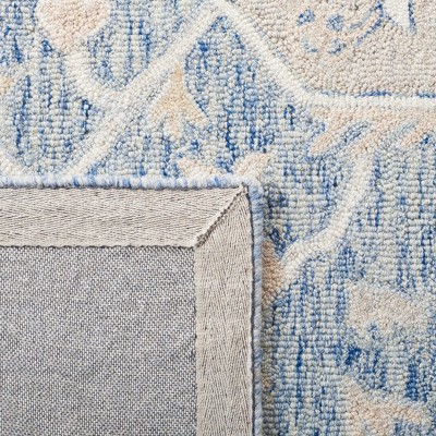 Ivory and Blue Handmade Wool Medallion Area Rug
