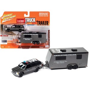 1997 Chevrolet Tahoe "SWAT" Custom Gray Metallic and Black w/Camper Trailer 1/64 Diecast Model Car by Johnny Lightning - 1 of 3