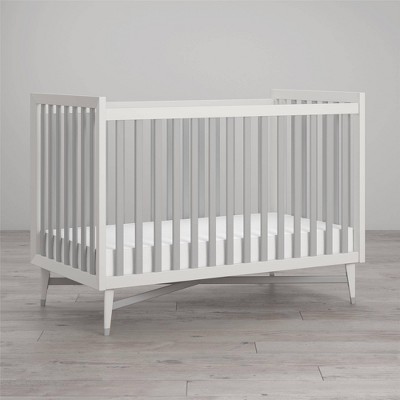 gray and white crib