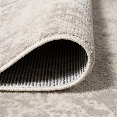 Ivory Rectangular Stain-Resistant Synthetic Area Rug, 5'x8'