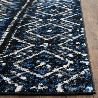Handmade Black and Silver Synthetic Washable Area Rug, 10' x 14'