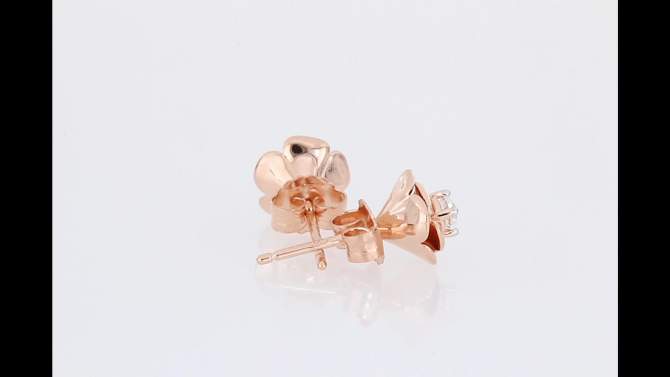 0.3 CT. T.W. White Sapphire Flower Stud Earrings in Sterling Silver - Pink, 2 of 3, play video