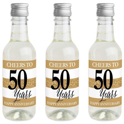 Big Dot of Happiness We Still Do - 50th Wedding Anniversary - Mini Wine and Champagne Bottle Label Stickers - Anniversary Party Favor Gift - Set of 16