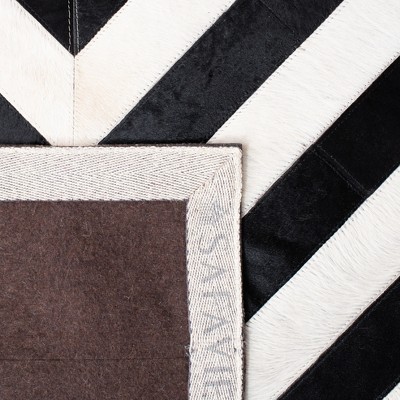 Handmade Black and White Geometric Cowhide Area Rug 4' x 6'