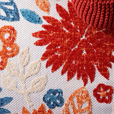 Cream and Red Floral 2' x 4' Synthetic Indoor/Outdoor Rug