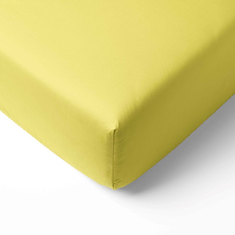 Bacati - Solid Yellow 100 percent Cotton Universal Baby US Standard Crib or Toddler Bed Fitted Sheet, 1 of 6