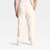 Adult Grinch Sled Fleece Graphic Pants - Cream - 3 of 3