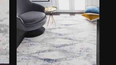 Ivory and Gold Geometric Flat Woven Synthetic Area Rug