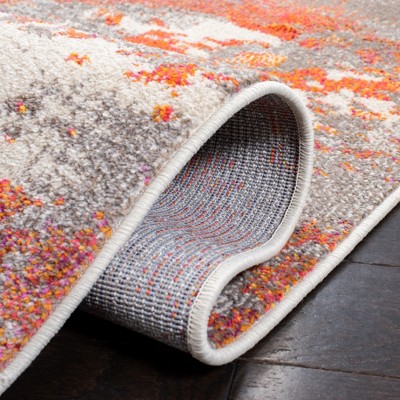 Gray and Orange Abstract 4' x 6' Synthetic Area Rug