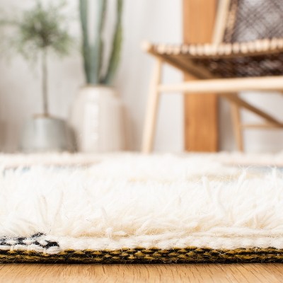 Kenya Collection Hand-Knotted Black and Ivory Wool 8' x 10' Area Rug