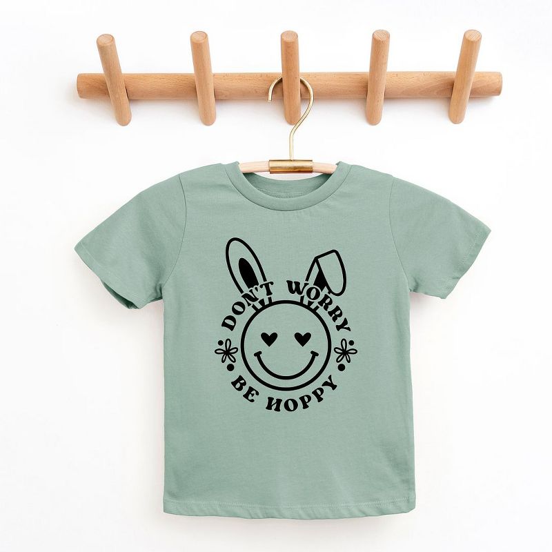 The Juniper Shop Don't Worry Be Hoppy Smiley Bunny Youth Short Sleeve Tee, 1 of 3