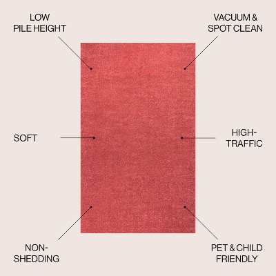 Red Oval Reversible Synthetic Area Rug 6'2" x 9'