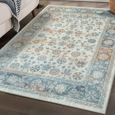 Ivory and Blue Floral Synthetic 5' x 7' Area Rug