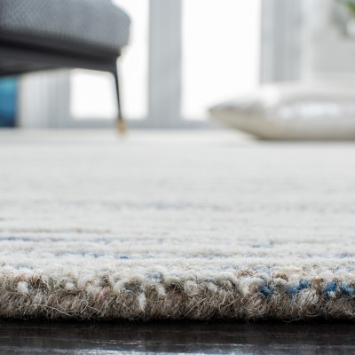 Light Blue Hand-Tufted Wool 6' x 9' Area Rug