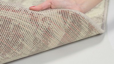 Ivory and Mauve Geometric Low Pile Area Rug