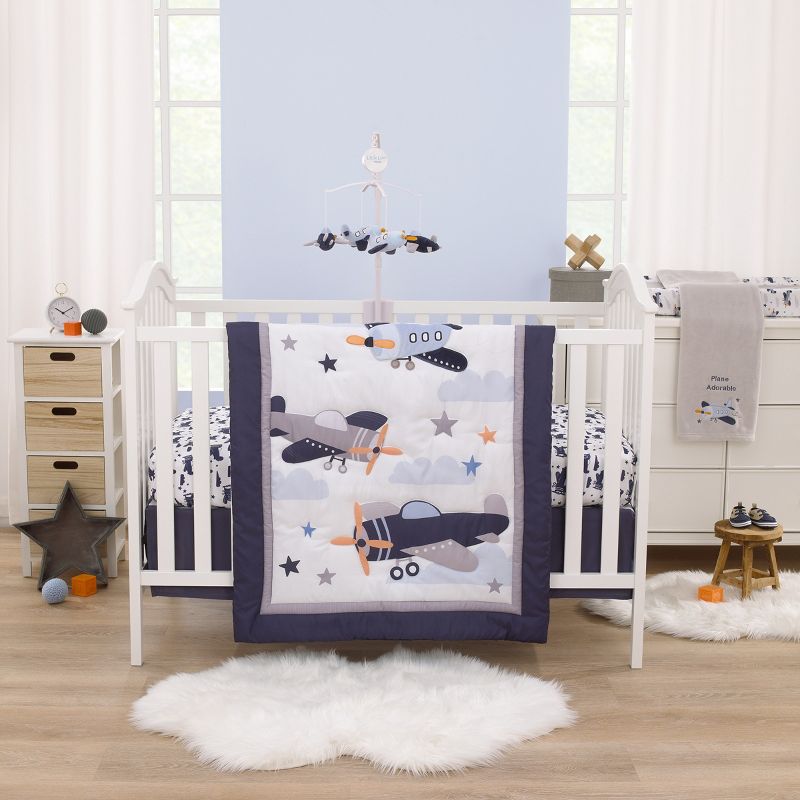 Little Love by NoJo Soar High Little One Navy, Light Blue, Orange, and White Airplanes, Clouds, and Stars Fitted Crib Sheet, 3 of 4