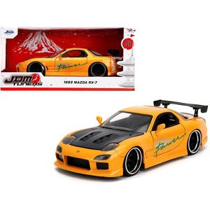 1993 Mazda RX-7 "HKS Power" Yellow with Carbon Hood "JDM Tuners" Series 1/24 Diecast Model Car by Jada - 1 of 4