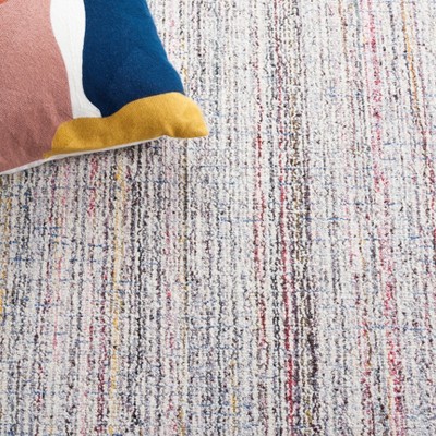 Handmade Red and Ivory Abstract Wool Area Rug, 4' x 6'