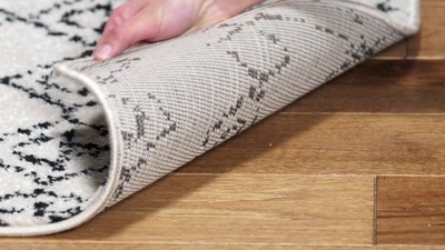 Handmade Off-White Wool and Synthetic Rectangular Area Rug