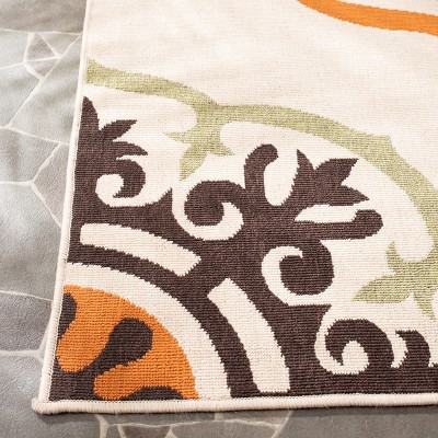 Cream and Terracotta Floral Indoor/Outdoor Washable Rug, 6'7" x 9'6"