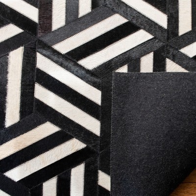 Handmade Black and Ivory Geometric Cowhide Area Rug