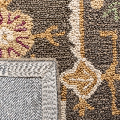 Handmade Ivory and Sage Wool Tufted Area Rug 6' x 9'