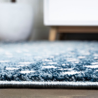 Ivory and Blue Abstract Antelope Washable Area Rug
