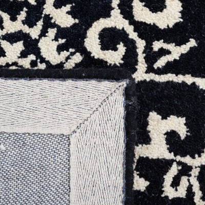 Handmade Black and Ivory Wool Tufted Runner Rug