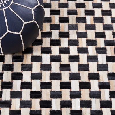 Black and Ivory Handmade Cowhide Area Rug