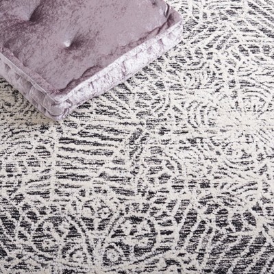 Black and Ivory Hand-Tufted Wool Floral Area Rug