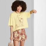 Women's Peanuts Ascot + Hart Snoopy Surf Short Sleeve Graphic Cropped T-Shirt - Yellow