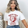 Simply Sage Market Women's Santa North Pole University Short Sleeve Garment Dyed Graphic Tee - 2 of 3