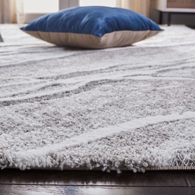 Century Blue and Gray Abstract Synthetic Area Rug 6'7" x 9'