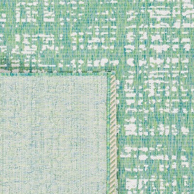 Ivory Synthetic Easy-Care Rectangular Outdoor Rug - 4' x 5'7"