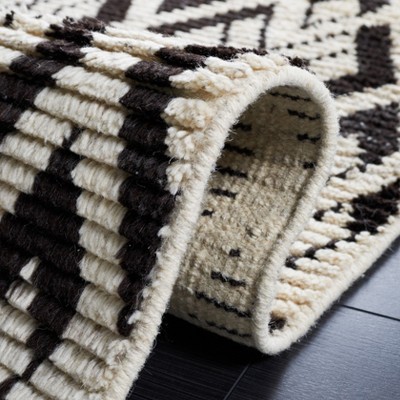 Hand-Knotted Black and Ivory Wool Area Rug, 5' x 8'