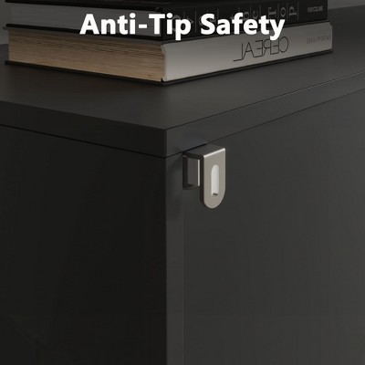 Anti-tip safety latch on side of dark cabinet