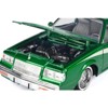 1987 Buick Regal 3.8 SFI Turbo Green Metallic and Cream with Graphics "Get Low" Series 1/24 Diecast Model Car by Motormax - 3 of 4