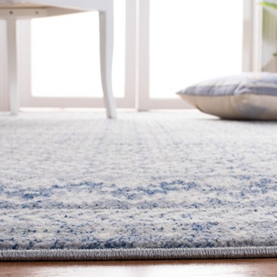 Ivory and Light Grey Synthetic Reversible Area Rug