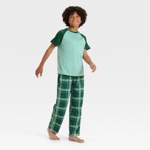 Boys' Short Sleeve T-Shirt and Plaid Fleece Pants Pajama Set - Cat & Jack™ - 1 of 4