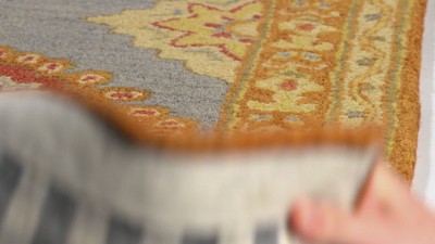Hand-Tufted Blue and Rust Wool 5' x 8' Area Rug